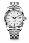 Seiko Datejust white dial automatic watch on architectural concrete background
Seiko Datejust stainless steel automatic watch close-up
Luxury Seiko Datejust textured white dial fluted bezel
